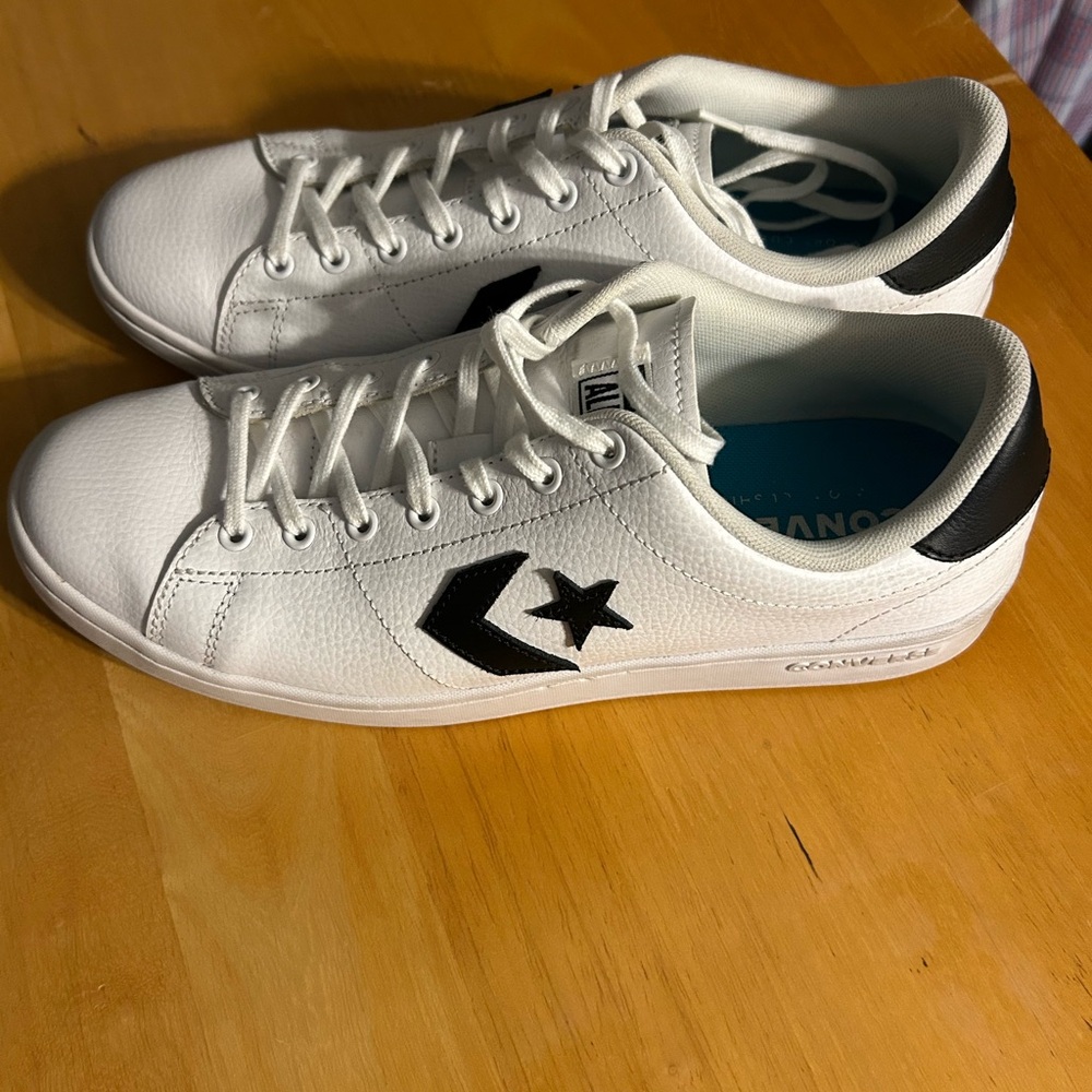 Converse Womenโsโ Pro Leather Ox White Sneakers with Black Accentsall court